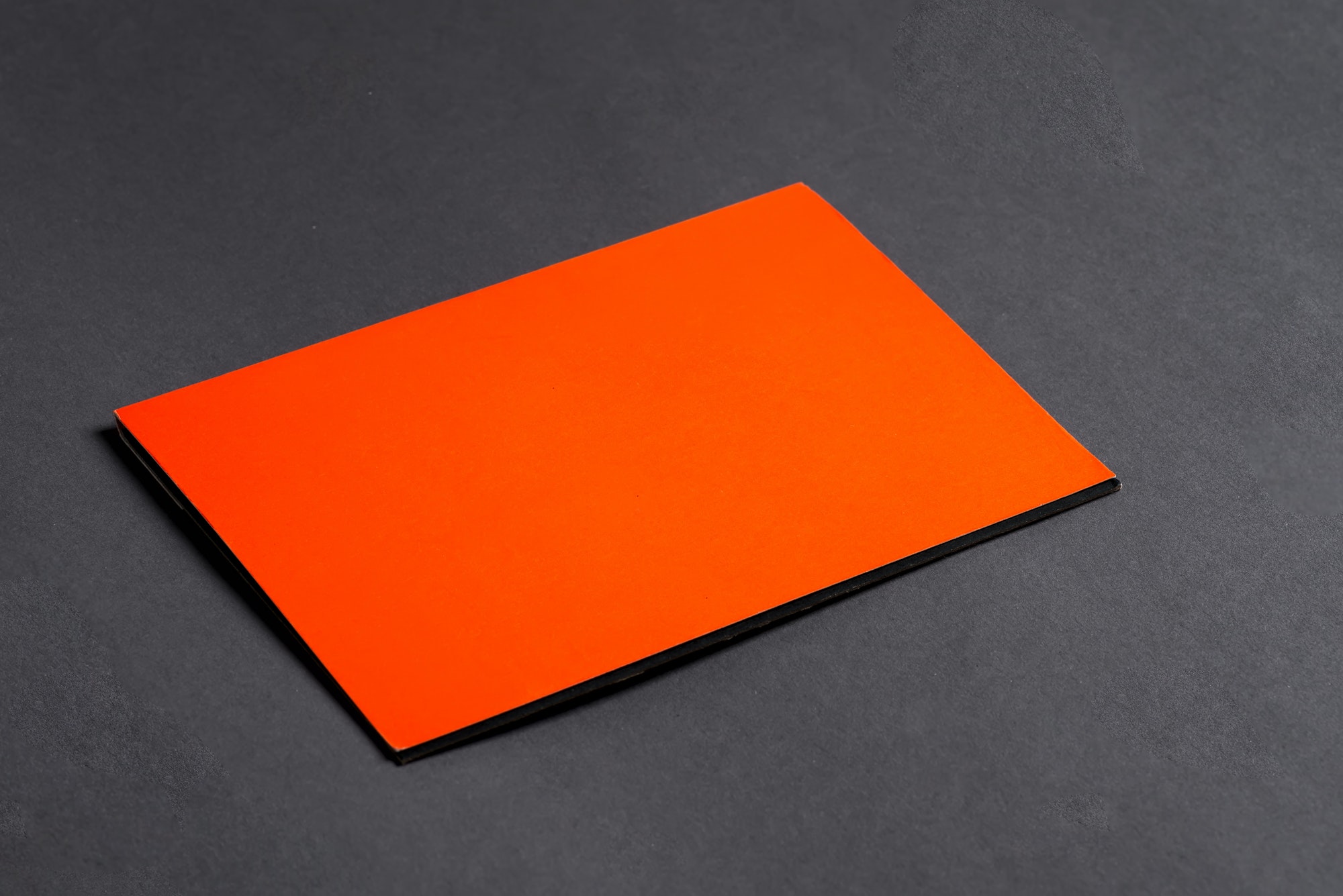 Mockup template paper brochure on a black background